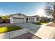 Two-story house with white exterior, landscaped lawn, and a two-car garage at 255 W Seagull Pl, Chandler, AZ 85286