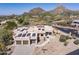 Aerial view of house with solar panels and mountain backdrop at 25838 N 104Th Pl, Scottsdale, AZ 85255