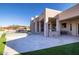 Spacious backyard patio with built-in grill and seating area at 25838 N 104Th Pl, Scottsdale, AZ 85255