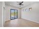 Bedroom with sliding glass door to backyard at 25838 N 104Th Pl, Scottsdale, AZ 85255