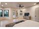 Bright bedroom with sliding glass doors opening to patio at 25838 N 104Th Pl, Scottsdale, AZ 85255