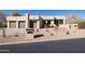 Stunning exterior with two-car garage and desert landscaping at 25838 N 104Th Pl, Scottsdale, AZ 85255