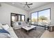 Bright living room with sliding doors opening to the backyard at 25838 N 104Th Pl, Scottsdale, AZ 85255