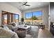 Relaxing living room with mountain views and fireplace at 25838 N 104Th Pl, Scottsdale, AZ 85255