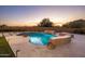 Inviting pool and spa with fire pit and expansive patio at 25838 N 104Th Pl, Scottsdale, AZ 85255