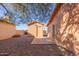 Spacious backyard with storage shed and gravel landscaping at 26430 S Pinewood Dr, Sun Lakes, AZ 85248