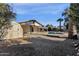 Backyard with refreshing pool, storage shed, and gravel landscaping at 2647 E Evergreen St, Mesa, AZ 85213