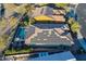 Aerial view of house with solar panels, pool, and desert landscape at 27648 N 102Nd Ln, Peoria, AZ 85383