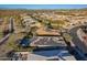 Aerial view of home with solar panels, pool, and desert landscape at 27648 N 102Nd Ln, Peoria, AZ 85383