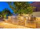 Stainless steel outdoor kitchen with built-in grill and sink at 27648 N 102Nd Ln, Peoria, AZ 85383