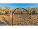 Modern playground with climbing nets and swings at 27648 N 102Nd Ln, Peoria, AZ 85383