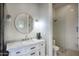 Elegant bathroom with a marble vanity and walk-in shower at 280 N 159Th St, Gilbert, AZ 85234