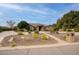 Single-story home with stone accents and landscaped front yard at 280 N 159Th St, Gilbert, AZ 85234