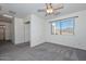 Bright bedroom with ceiling fan and view at 28025 N 23Rd Dr, Phoenix, AZ 85085