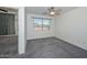 Spacious bedroom with ceiling fan and window at 28025 N 23Rd Dr, Phoenix, AZ 85085