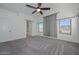 Large bedroom with mountain views and ceiling fan at 28025 N 23Rd Dr, Phoenix, AZ 85085