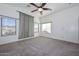 Bright bedroom with mountain views and ceiling fan at 28025 N 23Rd Dr, Phoenix, AZ 85085