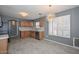 Kitchen with light wood cabinets, quartz countertops, and stainless steel appliances at 28025 N 23Rd Dr, Phoenix, AZ 85085