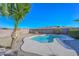 Relaxing kidney shaped pool with palm trees and mountain views at 28025 N 23Rd Dr, Phoenix, AZ 85085