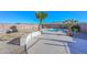 Backyard oasis with a kidney-shaped pool, desert landscaping, and mountain views at 28025 N 23Rd Dr, Phoenix, AZ 85085