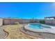 Landscaped backyard with a kidney-shaped pool and mountain views at 28025 N 23Rd Dr, Phoenix, AZ 85085