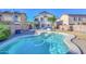 Home with a kidney-shaped pool and a large backyard patio at 28025 N 23Rd Dr, Phoenix, AZ 85085