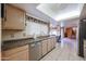 Spacious kitchen with stainless steel appliances and granite countertops at 2935 W Kristal Way, Phoenix, AZ 85027