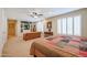 Bright main bedroom featuring a ceiling fan and built-in entertainment center at 2935 W Kristal Way, Phoenix, AZ 85027