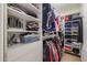 Spacious walk-in closet with ample shelving and hanging space at 2935 W Kristal Way, Phoenix, AZ 85027