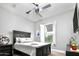 Comfortable bedroom with ample natural light, plush bedding, and stylish decor at 29615 N 55Th Pl, Cave Creek, AZ 85331