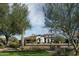 Single-story home with stucco exterior, landscaped yard at 29615 N 55Th Pl, Cave Creek, AZ 85331