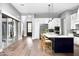 Open-concept kitchen features a large island, stainless steel appliances, and seamless flow to living area at 29615 N 55Th Pl, Cave Creek, AZ 85331
