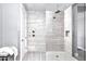 Modern shower features tiled walls, rainfall shower head, and glass enclosure at 29615 N 55Th Pl, Cave Creek, AZ 85331