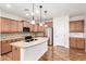 Kitchen with an island and stainless steel appliances at 31032 N Obsidian Dr, San Tan Valley, AZ 85143