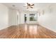 Living room with hardwood floors and access to the backyard at 31032 N Obsidian Dr, San Tan Valley, AZ 85143