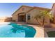 Inviting kidney shaped pool with a large patio area at 31032 N Obsidian Dr, San Tan Valley, AZ 85143