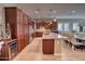 Large kitchen with dark wood cabinetry and granite countertops at 3331 E Coconino Dr, Gilbert, AZ 85298