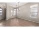 Bright dining area with tile floors and neutral-toned walls at 3403 E Wyatt Way, Gilbert, AZ 85297