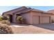 Two-car garage and attractive landscaping enhance this charming home's curb appeal at 3403 E Wyatt Way, Gilbert, AZ 85297