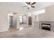 Living room featuring a fireplace and neutral decor at 3403 E Wyatt Way, Gilbert, AZ 85297