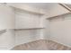 Large walk-in closet with double hanging rods and shelving at 3403 E Wyatt Way, Gilbert, AZ 85297