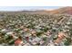 Aerial view of a residential neighborhood with mountain views at 3611 E Kachina Dr, Phoenix, AZ 85044