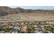 Aerial view of homes nestled near desert landscape at 3611 E Kachina Dr, Phoenix, AZ 85044