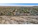 Aerial view of neighborhood and desert landscape at 3611 E Kachina Dr, Phoenix, AZ 85044