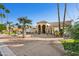 Front view of a beautiful home with a fountain and landscaping at 3611 E Kachina Dr, Phoenix, AZ 85044