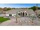 Grand home exterior with fountain and lush landscaping at 3611 E Kachina Dr, Phoenix, AZ 85044