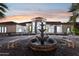 Elegant home exterior with a fountain and landscaping at 3611 E Kachina Dr, Phoenix, AZ 85044