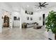 Light and airy living room with built-in shelving at 3611 E Kachina Dr, Phoenix, AZ 85044