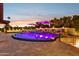 Stunning pool and spa with fire pit and lounge chairs at 3611 E Kachina Dr, Phoenix, AZ 85044