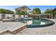 Curved pool with spa and outdoor entertainment area at 3611 E Kachina Dr, Phoenix, AZ 85044